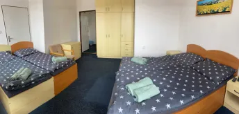 Čtyřlůžkový pokoj - s vlastním sociálním zařízením