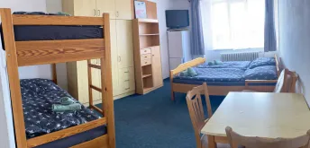 Čtyřlůžkový pokoj - bez vlastního sociálního zařízení
