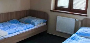 Třílůžkový pokoj se společným sociálním zařízením