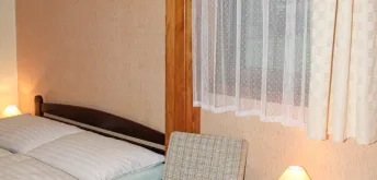 Čtyřlůžkový pokoj 