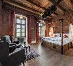 Dvoulůžkový pokoj RUSTIK s manželskou postelí a balkonem