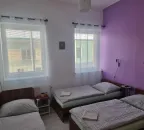 Třílůžkový pokoj Economy se sdílenou koupelnou