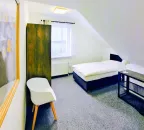 Osmilůžkový pokoj 