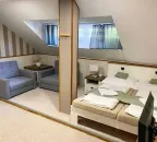 Třílůžkový pokoj s manželskou postelí a přistýlkou