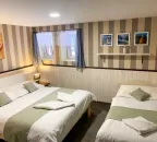 Třílůžkový pokoj s manželskou postelí