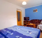 Čtyřlůžkový pokoj s oddělenou ložnicí