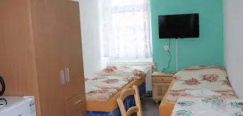 Dvoulůžkový pokoj se společnou koupelnou