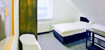Osmilůžkový pokoj 